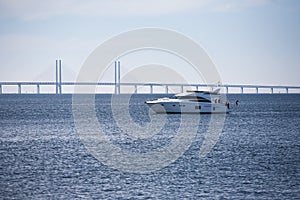 Oresund Bridge with boat photo