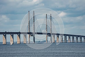 Oresund Bridge Connecting Malmo and Copenhagen on an Overcast Day photo