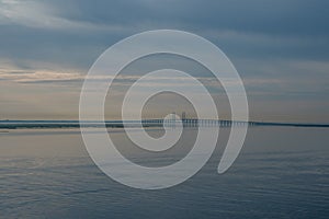 Oresund bridge in Denmark during sunrise seen from curiseship