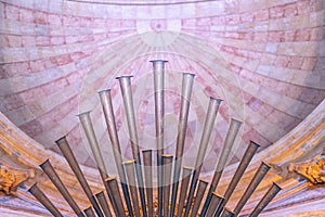 organ with details of the pipes inside the national pantheon, church of santa engracia, colored lighting.  Lisbon