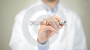 Organ Donation , Doctor writing on transparent screen