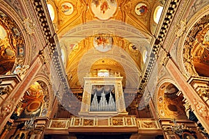 Organ and ornate ceiling.