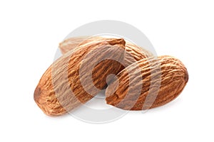 Organic almond nuts on white background