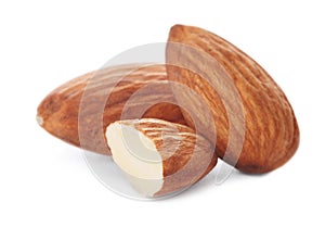 Organic almond nuts on white background