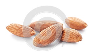 Organic almond nuts on white background