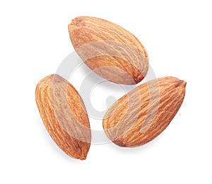Organic almond nuts on white background,