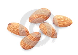 Organic almond nuts on white background,