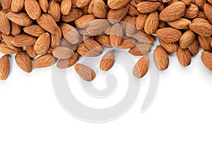 Organic almond nuts on white background, top view