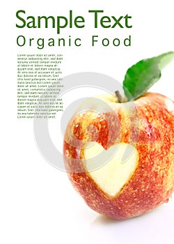 Organic apple with heart cutout