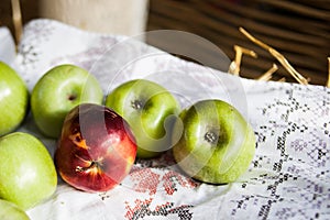 Organic apples in basket . Fresh apples in nature