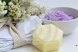 Organic beauty spa with natural thyme soap and cotton towels, ba