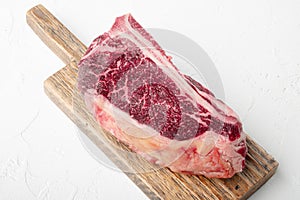 Organic beef meat raw steak, Club steak cut, on white stone  surface