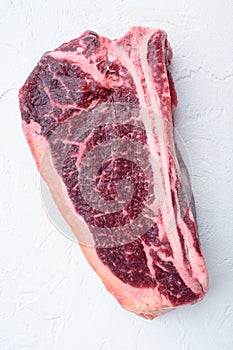 Organic beef meat raw steak, Club steak cut, on white stone  surface, top view flat lay