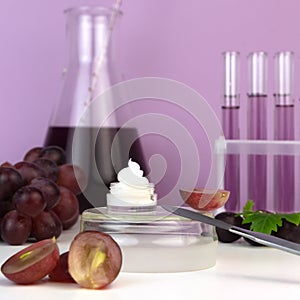 Organic bio grape cosmetics. Extract, grape seed oils, serum. Abstract cosmetic laboratory