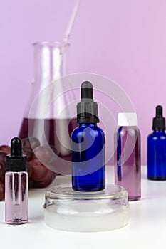 Organic bio grape cosmetics. Extract, grape seed oils, serum. Abstract cosmetic laboratory