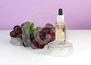 Organic bio grape cosmetics. Extract, grape seed oils, serum. Abstract cosmetic laboratory