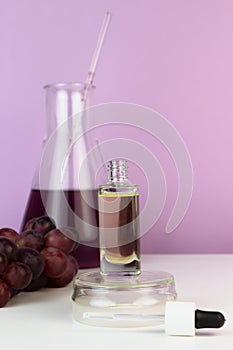 Organic bio grape cosmetics. Extract, grape seed oils, serum. Abstract cosmetic laboratory