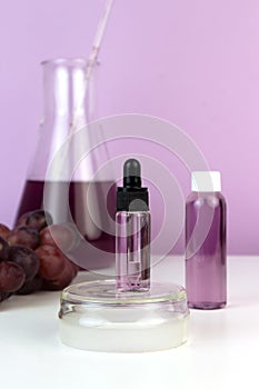 Organic bio grape cosmetics. Extract, grape seed oils, serum. Abstract cosmetic laboratory