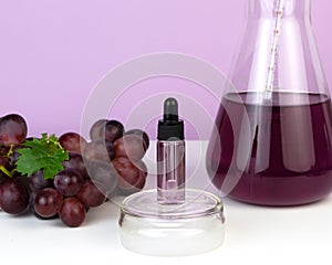 Organic bio grape cosmetics. Extract, grape seed oils, serum. Abstract cosmetic laboratory