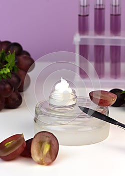 Organic bio grape cosmetics. hydrating cream. Extract, grape seed oils, serum. Abstract cosmetic laboratory