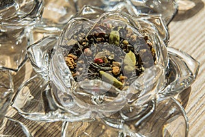 Organic black Chai tea in a glass flower bowl