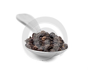 Organic Black Pepper in Spoon on White Background