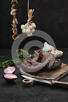 Blood pudding on cutting board