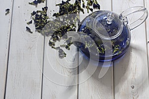 Organic blue tea Anchan, Clitoria, Butterfly Pea in glass teapot