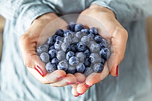 Organic blueberry female soft hands.
