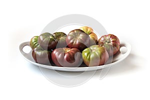 Organic Brandywine tomatoes on a plate