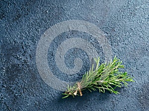 Organic bunch of fresh rosemary on the table