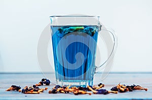 Organic Butterfly pea flowers blue Anchan tea in a glass mug