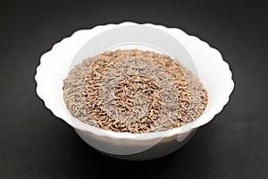 Organic Caraway in ceramic bowl