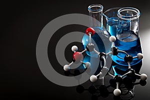 Organic chemistry, science class and STEM research concept with a methyl benzoate molecule on blue chemical solution in chemistry