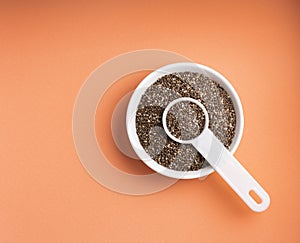 Organic chia seeds in the bowl and spoon - Salvia hispÃÂ¡nica photo