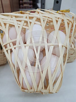 organic chicken eggs in bamboo basket