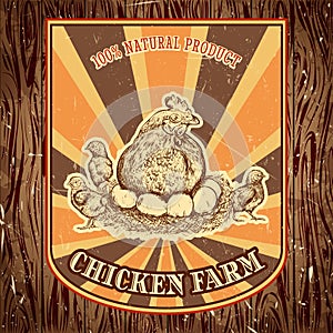 Organic chicken farm vintage label with hen with chicks on the grunge background.