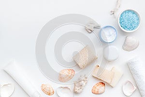 Organic cosmetic set with Dead Sea salt, cream and lotion on white background top view mock up