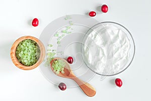 Organic cosmetics with extracts of berries white background top view