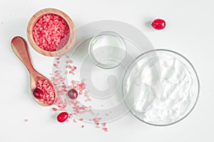 Organic cosmetics with extracts of berries white background top view