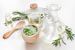 Organic cosmetics with extracts of herbs rosemary on white background