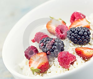 Organic cottage cheese with blackberry, strawberry and raspberry