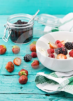 Organic cottage cheese with blackberry, strawberry and raspberry