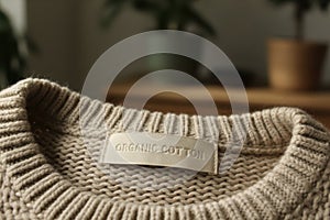Organic cotton label on a knitted sweater