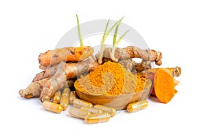 Organic curcumin or turmeric powder, capsule, and fresh root on white background