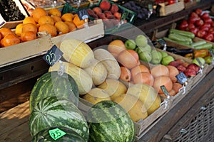 Organic different fresh fruits and vegetables on display in the market
