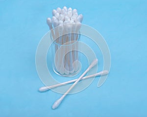 Organic double end white cotton-tipped ear and make up swabs, buds on blue