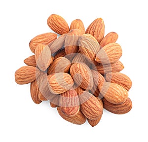 Organic dried apricot kernels on white background