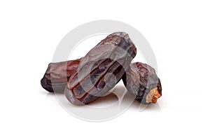 Organic Dried Kabkab dates close-up Isolated over white background