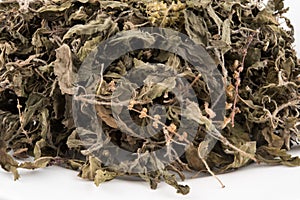 Organic dry Green or Holy Basil Ocimum tenuiflorum leaves on w